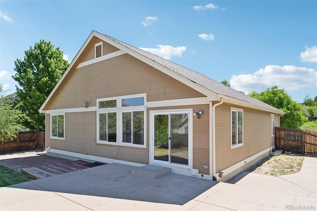 back of property with a patio area