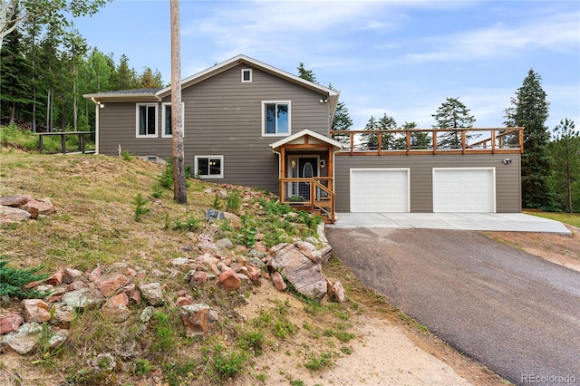 6773 Snowshoe Trl, Evergreen, CO 80439 - view of front facade with driveway