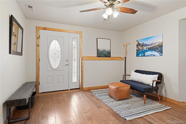6773 Snowshoe Trl, Evergreen, CO 80439 - entryway with wood finished floors and a ceiling fan