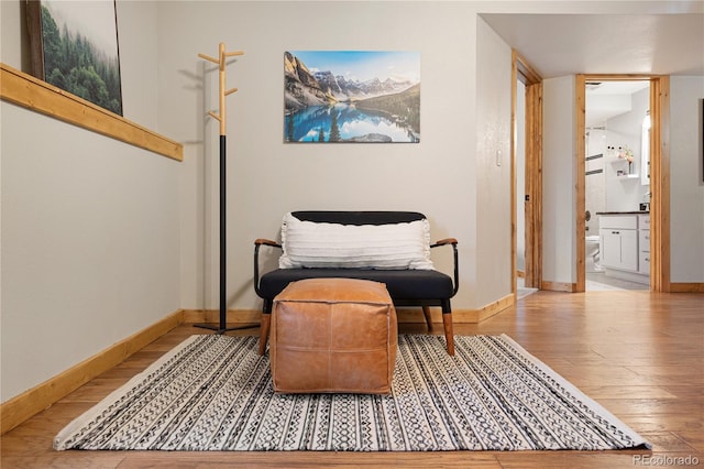 6773 Snowshoe Trl, Evergreen, CO 80439 - living area featuring wood-type flooring and baseboards