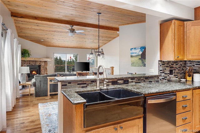 6773 Snowshoe Trl, Evergreen, CO 80439 - kitchen with dishwasher, wooden ceiling, light wood finished floors, decorative backsplash, and dark stone counters