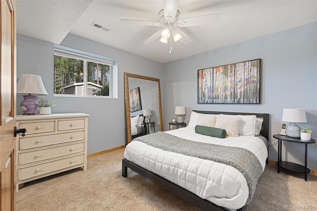 6773 Snowshoe Trl, Evergreen, CO 80439 - bedroom featuring light carpet and ceiling fan