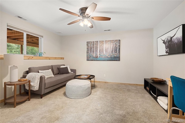 6773 Snowshoe Trl, Evergreen, CO 80439 - carpeted living room with ceiling fan and baseboards