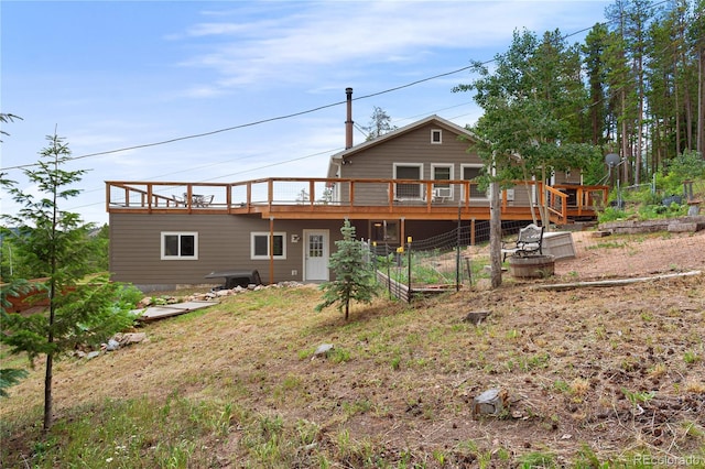 6773 Snowshoe Trl, Evergreen, CO 80439 - rear view of house with a deck