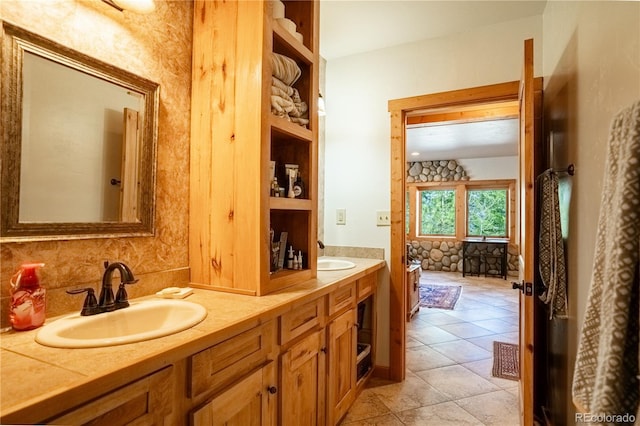 bathroom featuring vanity and tile patterned floors