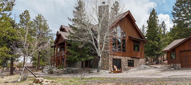 view of home's exterior with stone siding