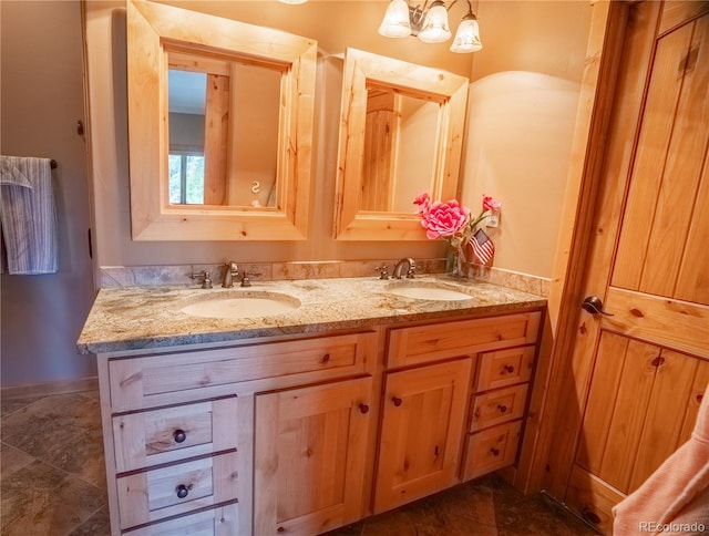 bathroom with double vanity and a sink