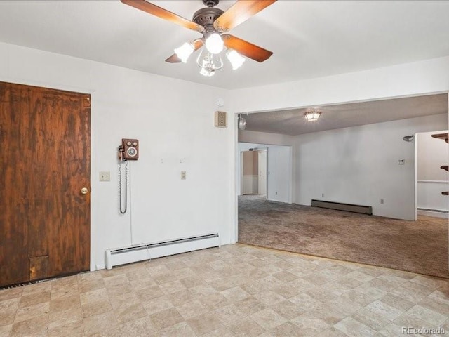 423 Empire St, Aurora, CO 80010 - empty room with baseboard heating, light colored carpet, a baseboard radiator, and a ceiling fan