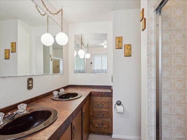 423 Empire St, Aurora, CO 80010 - full bathroom featuring double vanity and a stall shower