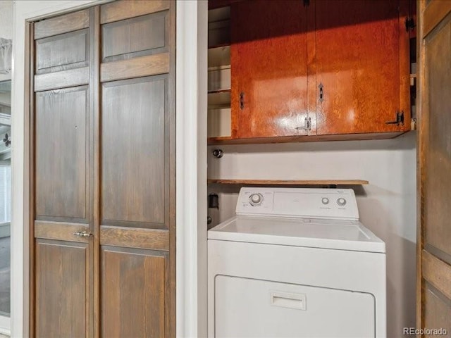 423 Empire St, Aurora, CO 80010 - laundry room featuring washer / clothes dryer and cabinet space
