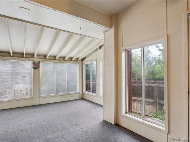 423 Empire St, Aurora, CO 80010 - unfurnished sunroom with lofted ceiling