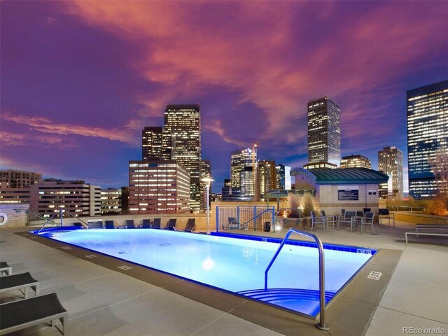 2001 Lincoln St Unit 1822, Denver, CO 80202 - pool featuring a view of city and a patio area