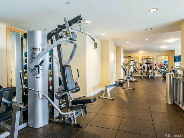 2001 Lincoln St Unit 1822, Denver, CO 80202 - exercise room featuring baseboards and recessed lighting