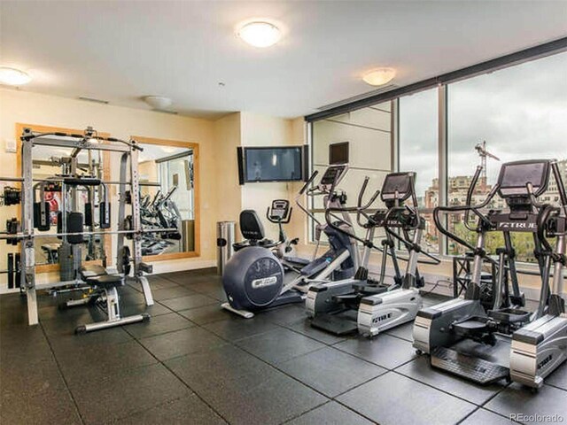 2001 Lincoln St Unit 1822, Denver, CO 80202 - workout area featuring expansive windows
