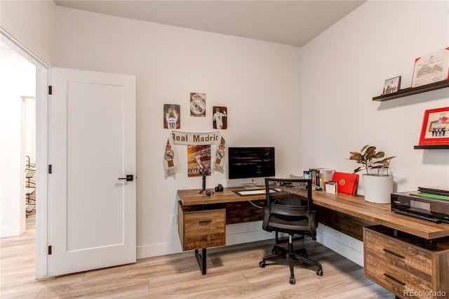 home office featuring light hardwood / wood-style floors