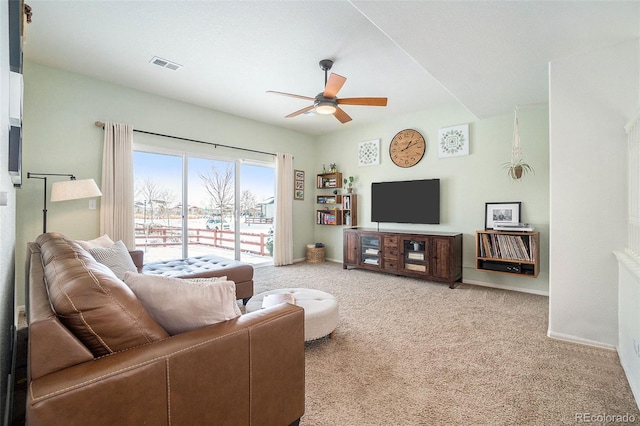2137 Day Spring Dr, Windsor, CO 80550 - living room featuring ceiling fan, carpet flooring, and baseboards