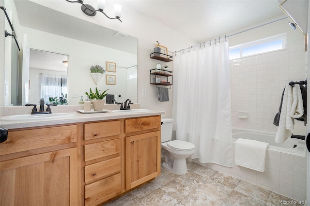 2137 Day Spring Dr, Windsor, CO 80550 - full bath with shower / bathtub combination with curtain, double vanity, and toilet