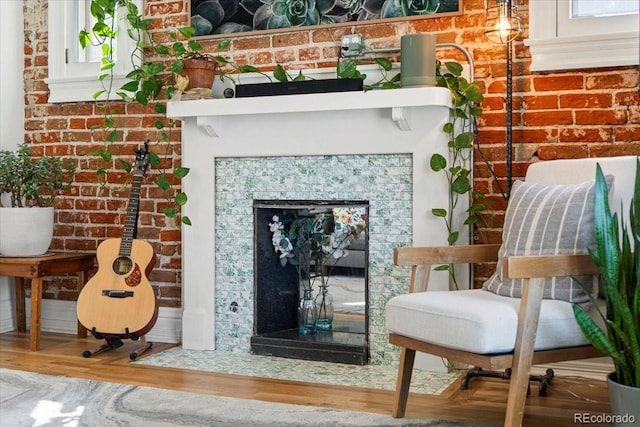 3384 W 29th Ave, Denver, CO 80211 - detailed view of wood finished floors and a fireplace with flush hearth
