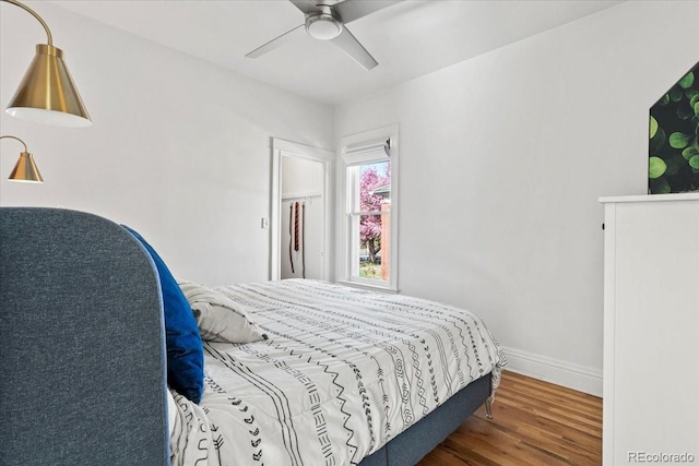 3384 W 29th Ave, Denver, CO 80211 - bedroom with wood finished floors, baseboards, and ceiling fan