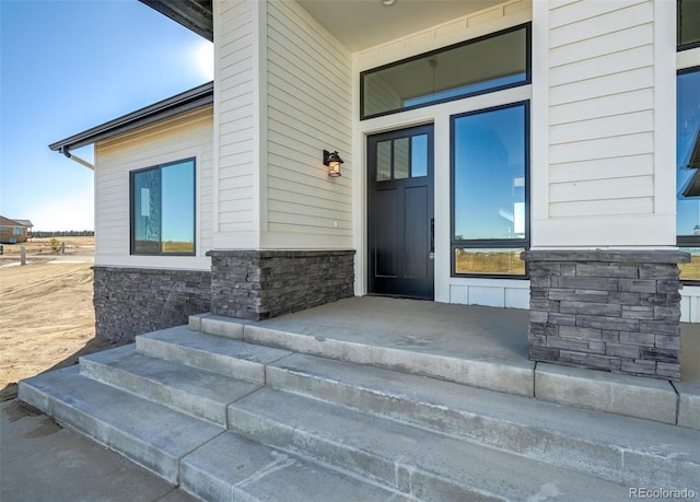 property entrance with a porch