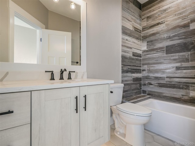 full bathroom with tile patterned flooring, vanity, toilet, and tiled shower / bath combo