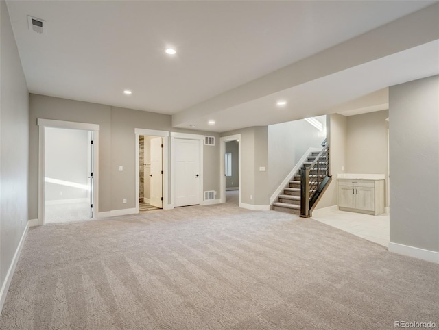 basement with light carpet