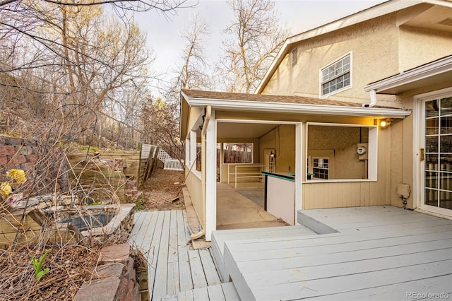 2706 Penacho Cir, Colorado Springs, CO 80917 - deck featuring a sunroom and fence