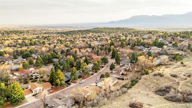 2706 Penacho Cir, Colorado Springs, CO 80917 - aerial perspective of suburban area featuring a mountain backdrop
