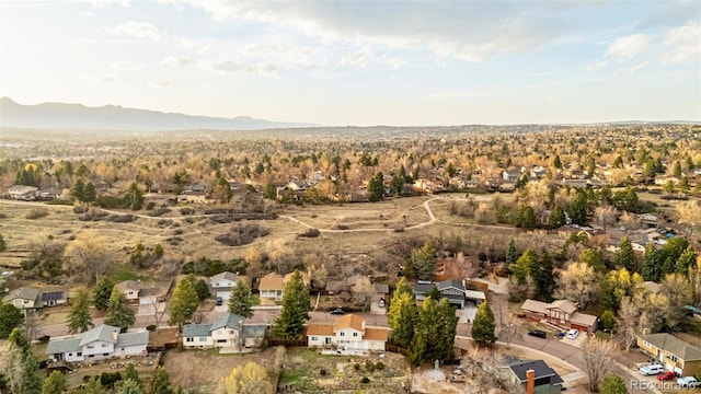 2706 Penacho Cir, Colorado Springs, CO 80917 - aerial view of property and surrounding area featuring nearby suburban area and a mountain backdrop