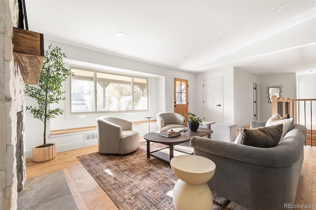 13416 W 22nd Pl, Golden, CO 80401 - living room featuring visible vents, baseboards, and wood finished floors