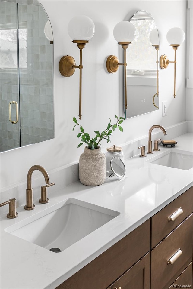 13416 W 22nd Pl, Golden, CO 80401 - full bathroom featuring a sink, a shower stall, and double vanity