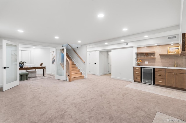 13416 W 22nd Pl, Golden, CO 80401 - bar featuring beverage cooler, indoor wet bar, recessed lighting, visible vents, and stairway