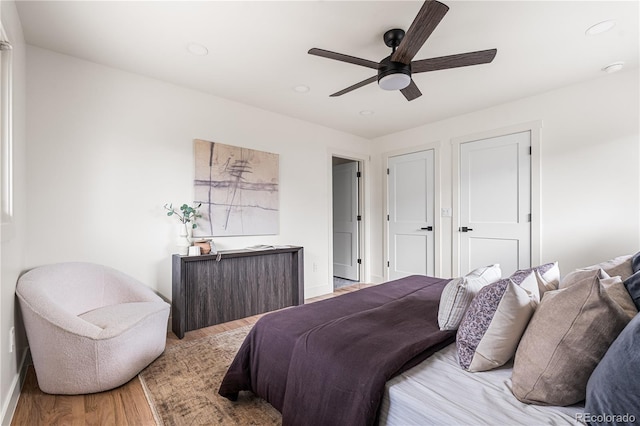13416 W 22nd Pl, Golden, CO 80401 - bedroom featuring baseboards, ceiling fan, recessed lighting, and light wood-style flooring