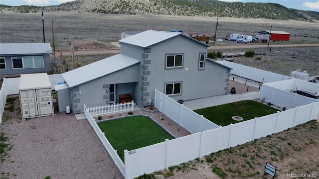view from above of property featuring a mountainous background