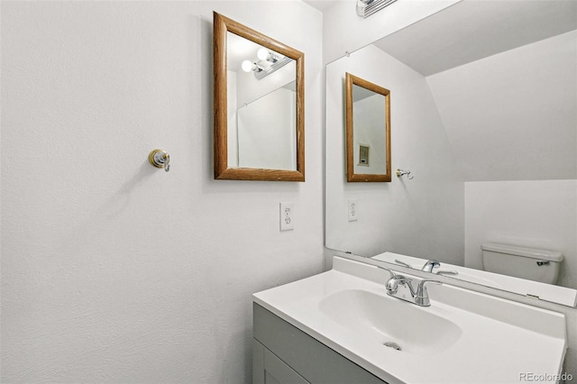 17094 E Tennessee Dr Unit 212, Aurora, CO 80017 - bathroom featuring vanity and toilet