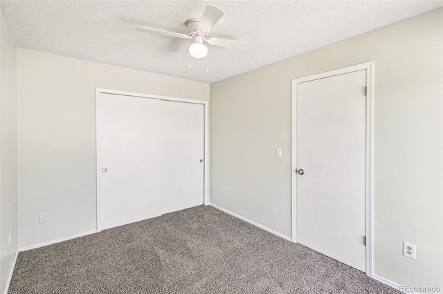 17094 E Tennessee Dr Unit 212, Aurora, CO 80017 - unfurnished bedroom with carpet, a textured ceiling, a closet, and a ceiling fan