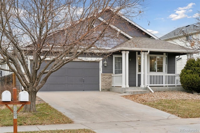 view of front of house with a garage and covered porch