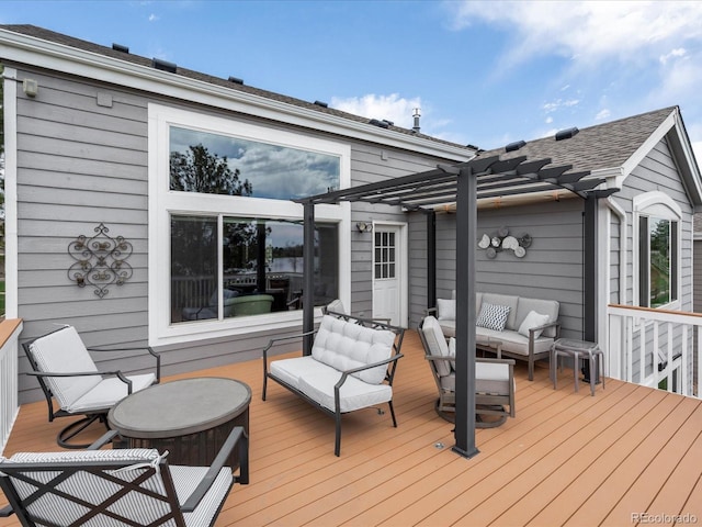 wooden deck featuring a pergola and outdoor lounge area