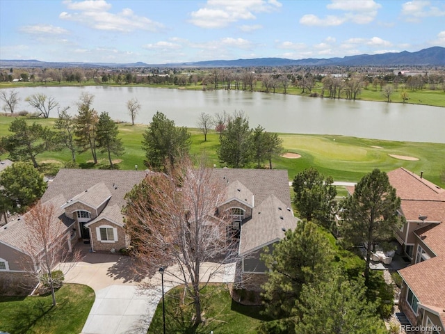bird's eye view with a water and mountain view and view of golf course