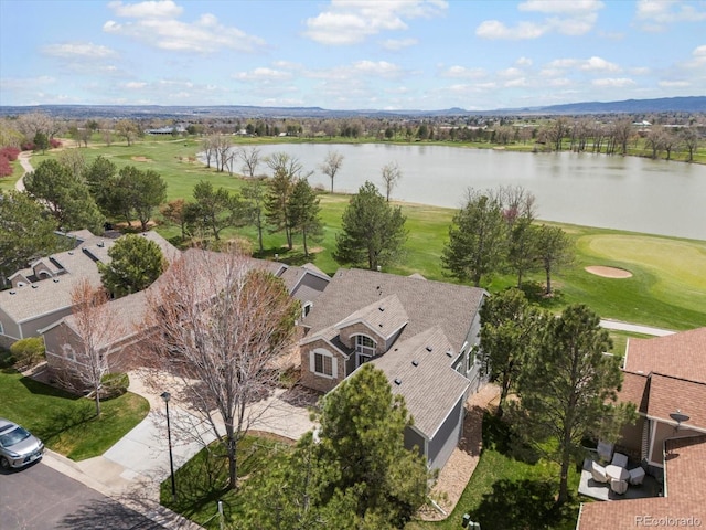 aerial view featuring a water view and golf course view