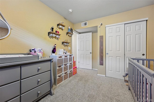 4705 Andes St, Denver, CO 80249 - bedroom featuring light colored carpet, a closet, and baseboards
