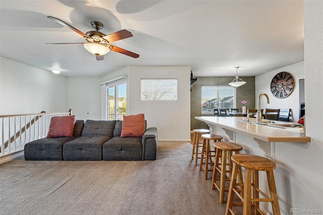 4705 Andes St, Denver, CO 80249 - living room with a ceiling fan and carpet flooring