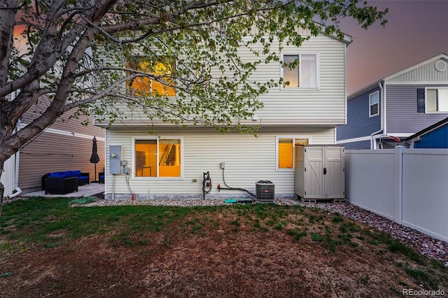 4705 Andes St, Denver, CO 80249 - back of house with fence, cooling unit, and a patio area