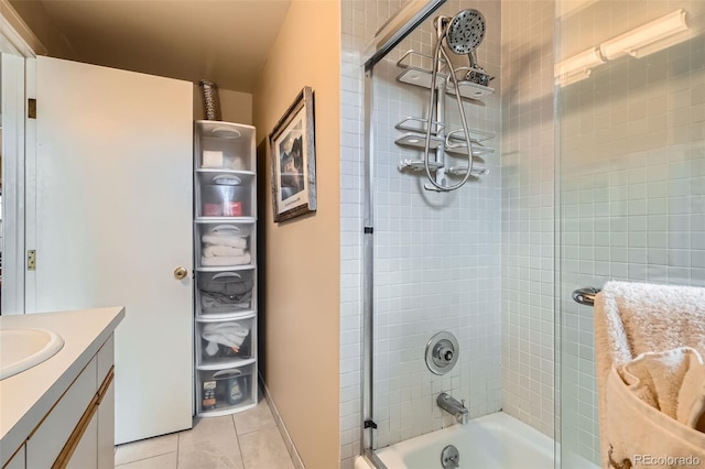 bathroom with vanity, washtub / shower combination, and tile patterned floors