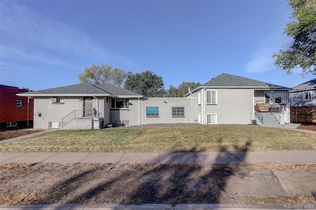 2275 S Cherokee St, Denver, CO 80223 - view of front of home with a front yard