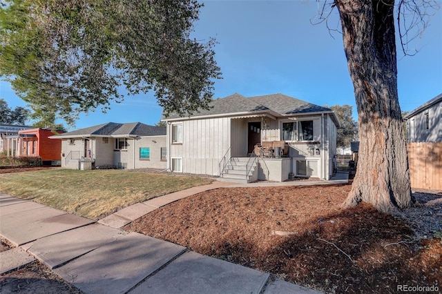 2275 S Cherokee St, Denver, CO 80223 - view of front of home featuring roof with shingles