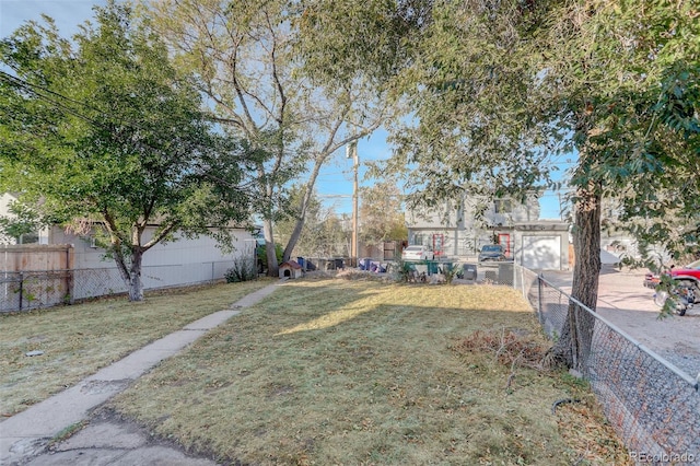 view of yard featuring a garage