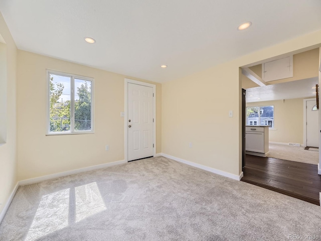 empty room with light hardwood / wood-style floors