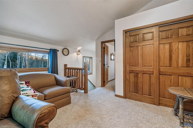 2150 Michigan Hill Rd, Jefferson, CO 80456 - carpeted living area featuring vaulted ceiling and plenty of natural light