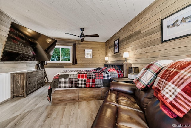 2150 Michigan Hill Rd, Jefferson, CO 80456 - bedroom with wood walls and wood finished floors
